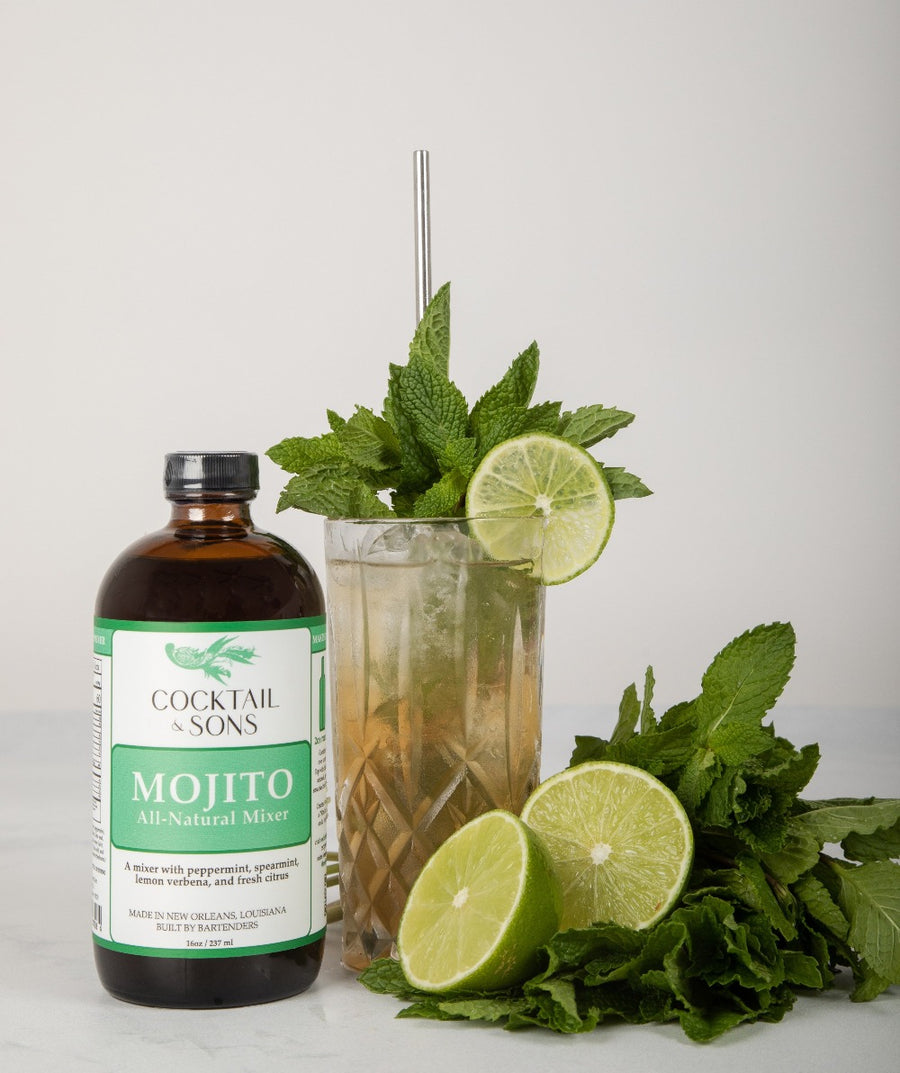 Cocktail and Sons Mojito mix used to make the classic cocktail in a crystal Colins glass, and garishly garnished 